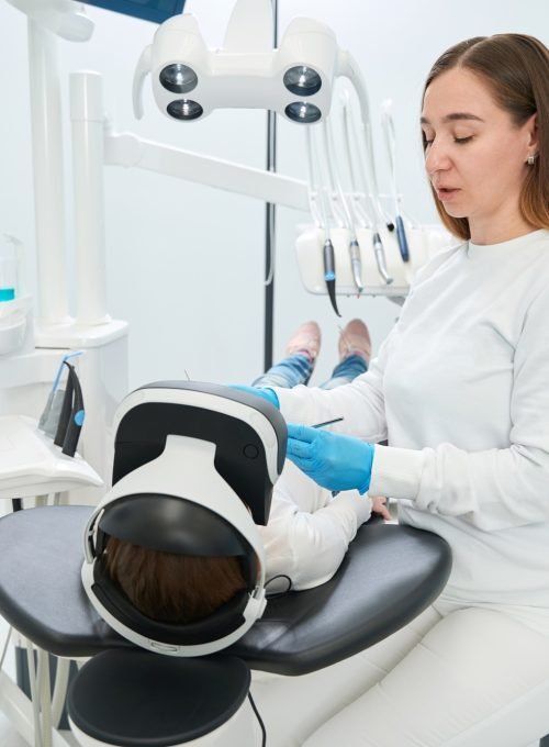 Kid undergoing dental check-up in modern clinic
